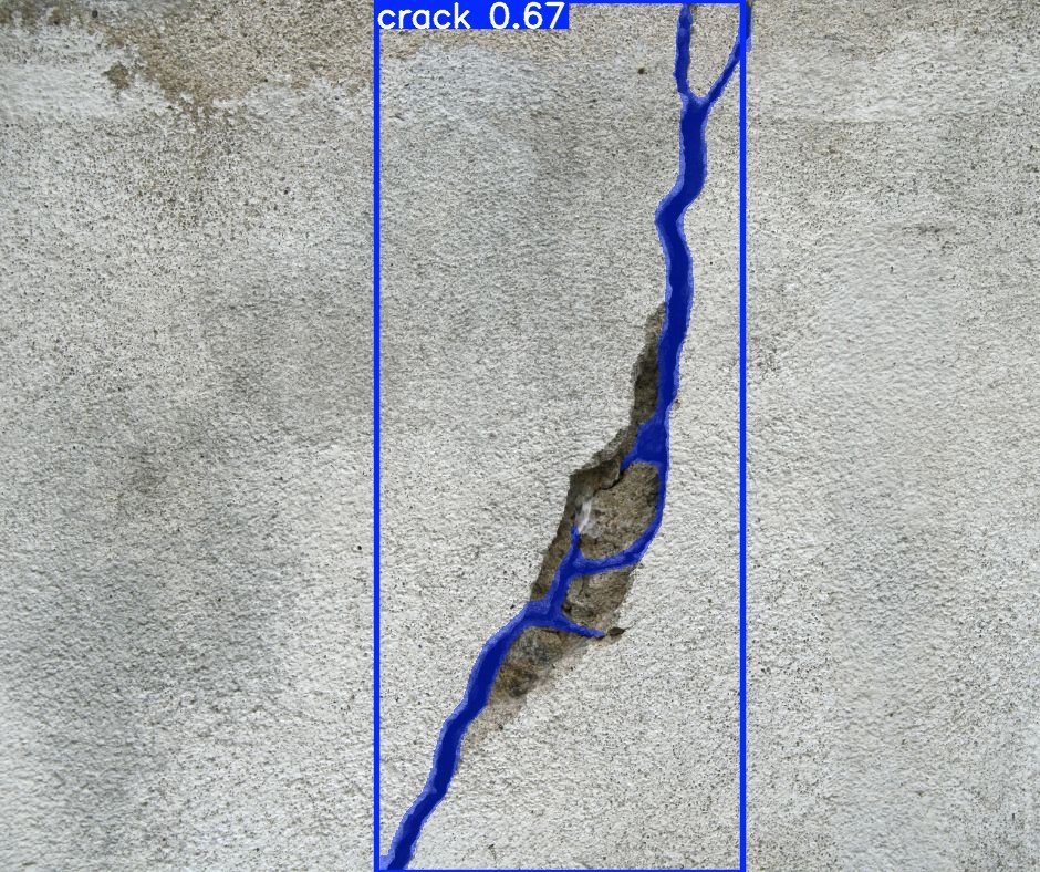 Concrete wall with a crack outlined by a detection box labelled crack, confidence 0.67